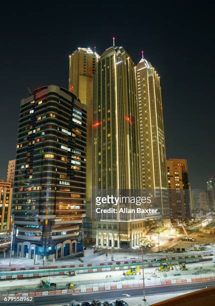 elevated view of skyscrapers in abu dhabi - abu dhabi night stock pictures, royalty-free photos & images