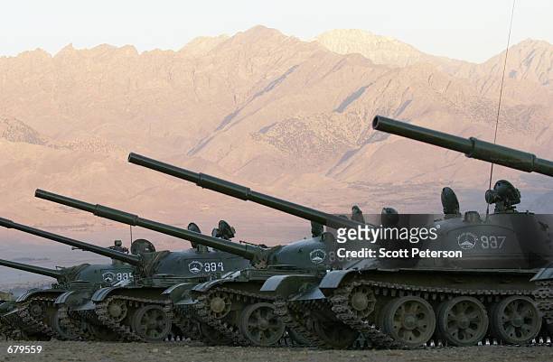 Northern Alliance troops use tanks during a three-day 500-soldier military exercise November 4, 2001 on a training ground in Jabal Saraj,...