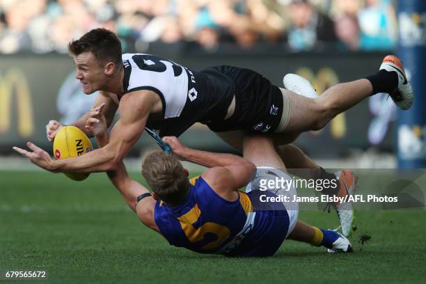 Robbie Gray of the Power is tackled by Brad Sheppard of the Eagles during the 2017 AFL round 07 match between Port Adelaide Power and the West Coast...