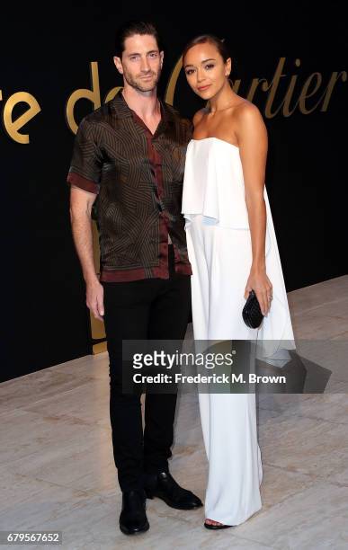 Actor Iddo Goldberg and actress Ashley Madekwe attend Panthere De Cartier Party in LA at Milk Studios on May 5, 2017 in Los Angeles, California.