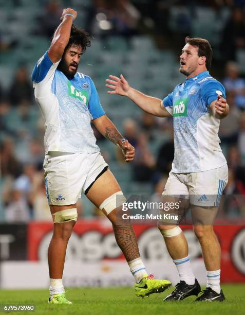 Akira Ioane of the Blues celebrates scoring a try during the round 11 Super Rugby match between the Waratahs and the Blues at Allianz Stadium on May...