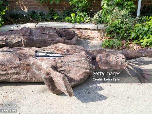 Statue depicting the Statue of Liberty as a prison lies on the ground at the Museum- Garden of Anti Arrogance housed in the former American embassy...