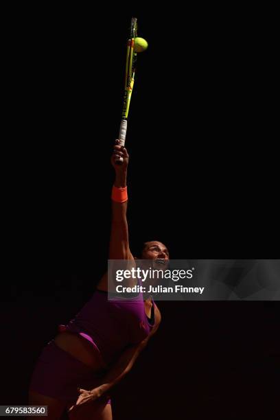 Roberta Vinci of Italy serves to Daria Kasatkina of Russia during day one of the Mutua Madrid Open tennis at La Caja Magica on May 6, 2017 in Madrid,...