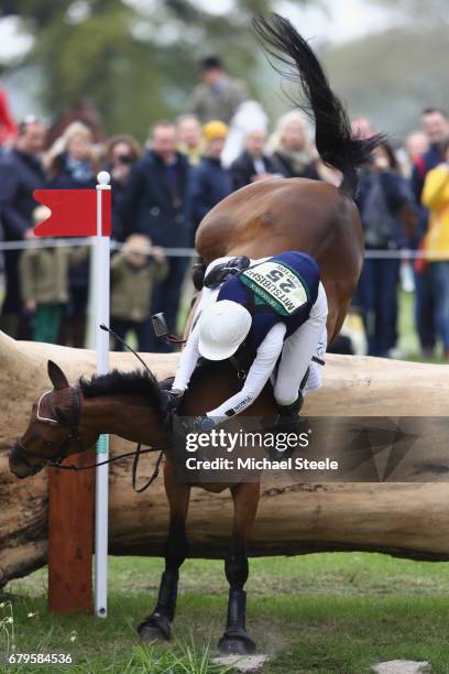 Willa Newton of Great Britain riding Chance Remark falls at fence fifteen during the Cross Country test on day four of Badminton Horse Trials on May...