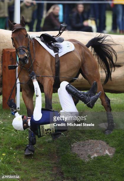 Willa Newton of Great Britain riding Chance Remark falls at fence fifteen during the Cross Country test on day four of Badminton Horse Trials on May...