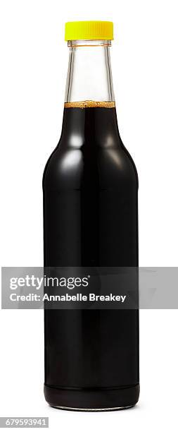 clear glass bottle with black liquid and no label - molasses stock pictures, royalty-free photos & images