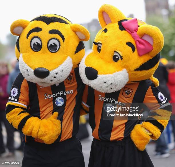 Rory and Amber, the Hull City tigers mascots pose outside the stadium prior to the Premier League match between Hull City and Sunderland at the KCOM...