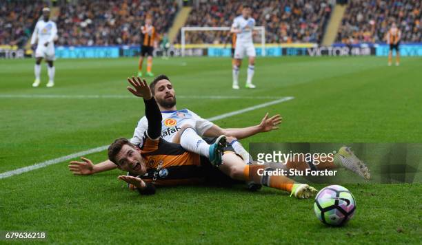Andrew Robertson of Hull City and Fabio Borini of Sunderland compete for the ball during the Premier League match between Hull City and Sunderland at...
