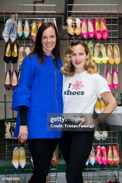 Brita Fernandez Schmidt and Charlotte Olympia attend the Women for Women International #SheInspiresMe car boot sale at Brewer Street Car Park on May...
