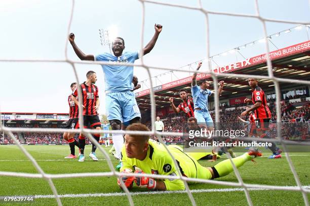 Mame Biram Diouf of Stoke City celebrates after Lys Mousset of AFC Bournemouth scores a own goal for Stoke City's first goal during the Premier...