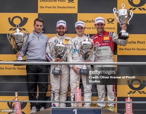 Race 1 Winner Lucas Auer of Mercedes-AMG DTM Team Muecke with second placed Timo Glock of BMW M4 Team RMG and third placed Mike Rockenfeller of Audi...