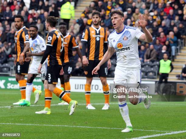 Billy Jones of Sunderland celebrates after he opens the scoring with a diving header during the Premier League match between Hull City and Sunderland...