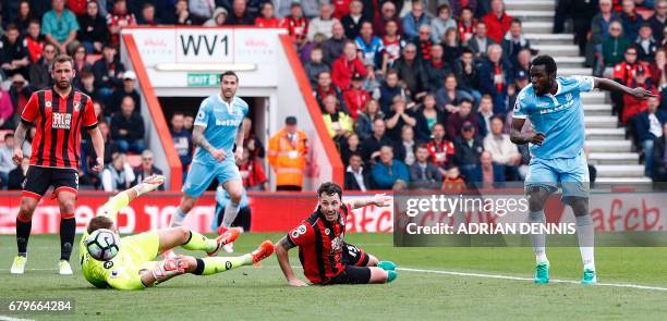 Stoke City's Senegalese striker Mame Biram Diouf scores his team's second goal during the English Premier League football match between Bournemouth...