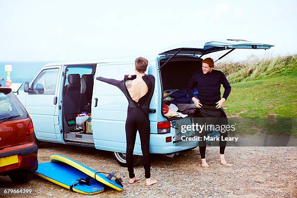 getting changed - surf van stock pictures, royalty-free photos & images