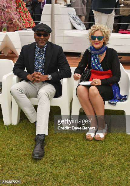 Colin Salmon and Fiona Hawthorne attend the Audi Polo Challenge at Coworth Park on May 6, 2017 in Ascot, United Kingdom.