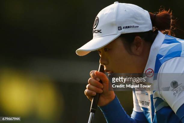 Shanshan Feng of China lines up her putt during the third round of the Citibanamex Lorena Ochoa Match Play Presented by Aeromexico and Delta at Club...