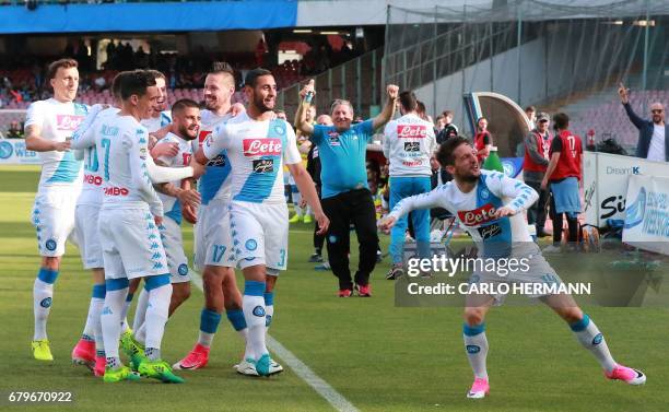 Napoli's Belgian forward Dries Mertens celebrates after scoring with teammates during the Italian Serie A football match SSC Napoli vs Cagliari...