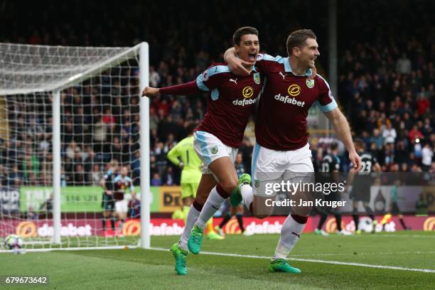 Sam Vokes of Burnley celebrates scoring his sides first goal with his Burnley team mate during the Premier League match between Burnley and West...