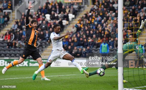 Jermain Defoe of Sunderland scores his sides second goal past Eldin Jakupovic of Hull City during the Premier League match between Hull City and...