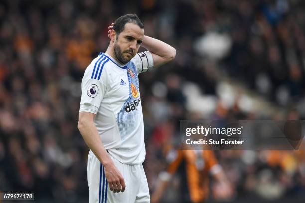 John O'Shea of Sunderland looks dejected during the Premier League match between Hull City and Sunderland at the KCOM Stadium on May 6, 2017 in Hull,...