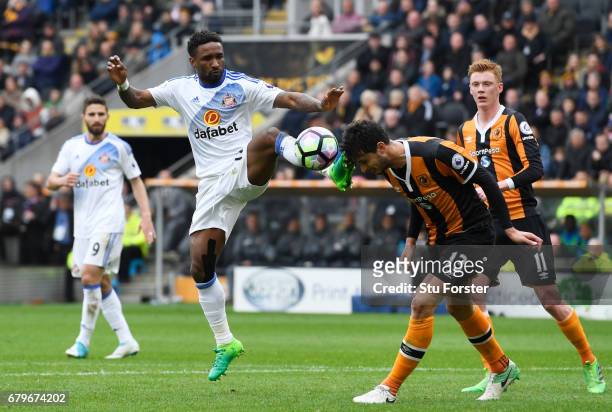 Jermain Defoe of Sunderland and Andrea Ranocchia of Hull City compete for the ball during the Premier League match between Hull City and Sunderland...