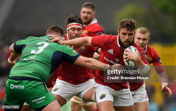 Munster , Ireland - 6 May 2017; Rhys Marshall of Munster is tackled by Conor Carey of Connacht during the Guinness PRO12 Round 22 match between...