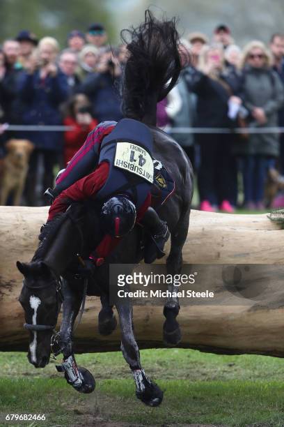 Pietro Sandei of Italy manages to hold on to his horse Mouse at fence fifteen during the Cross Country test on day four of Badminton Horse Trials on...