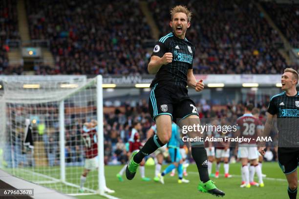 Craig Dawson of West Bromwich Albion celebrates after scoring a goal to make it 1-2 during the Premier League match between Burnley and West Bromwich...