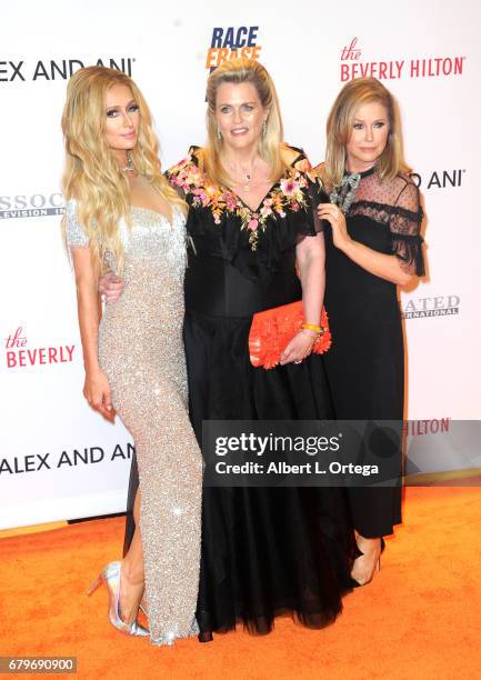 Socalite Paris Hilton, Nancy Davis and mother Kathy Hilton arrive for the 24th Annual Race To Erase MS Gala held at The Beverly Hilton Hotel on May...