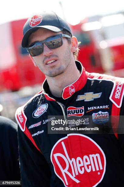 Ben Kennedy, driver of the Rheem Chevrolet, stands on the grid during qualifying for the NASCAR XFINITY Series Sparks Energy 300 at Talladega...