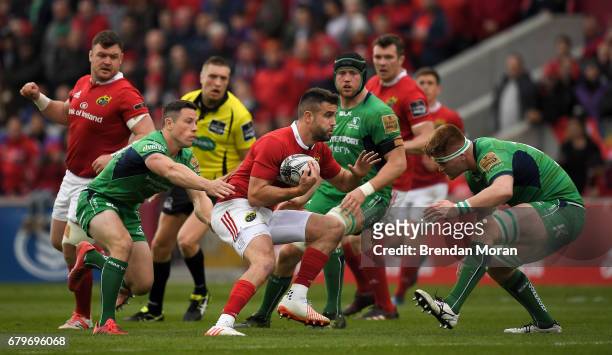 Munster , Ireland - 6 May 2017; Conor Murray of Munster is tackled by John Cooney, left, and Sean O'Brien of Connacht during the Guinness PRO12 Round...