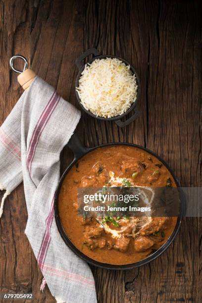above view of lamb curry meal. - biryani stock-fotos und bilder