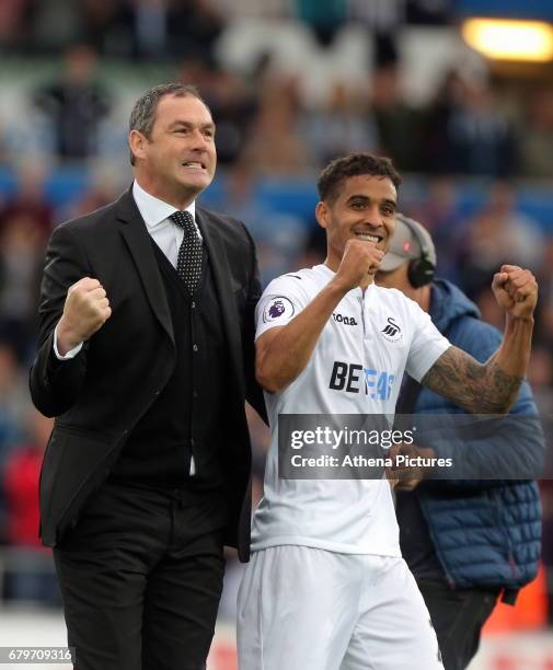 Swansea manager Paul Clement and Kyle Naughton of Swansea City celebrate their team's win after the Premier League match between Swansea City and...