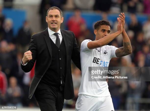 Swansea manager Paul Clement and Kyle Naughton of Swansea City celebrate their team's win after the Premier League match between Swansea City and...