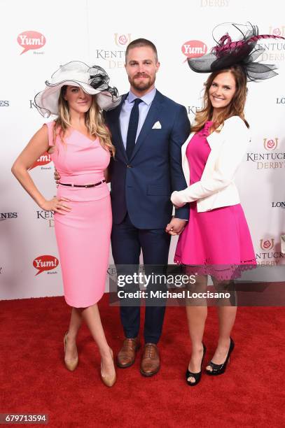 Stephen Amell and Cassandra Jean attend the 143rd Kentucky Derby at Churchill Downs on May 6, 2017 in Louisville, Kentucky.