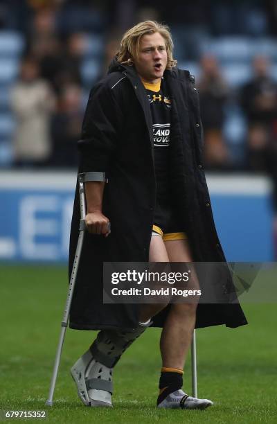 Tommy Taylor of Wasps who was injured in the match looks on during the Aviva Premiership match between Wasps and Saracens at The Ricoh Arena on May...
