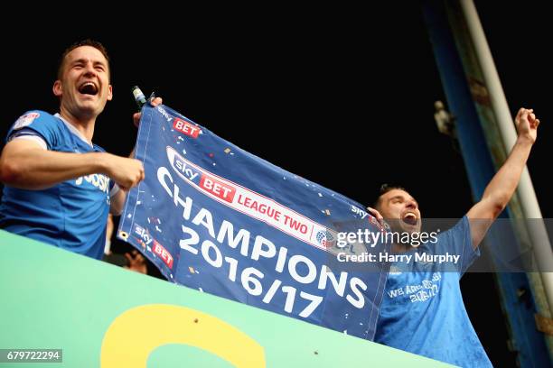 Michael Doyle and Gareth Evans celebrate being chmpions after the Sky Bet League Two match between Portsmouth and Cheltenham Town at Fratton Park on...