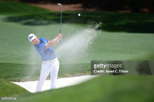 David Lingmerth of Sweden plays a shot out of a bunker on the 11th hole during round three of the Wells Fargo Championship at Eagle Point Golf Club...