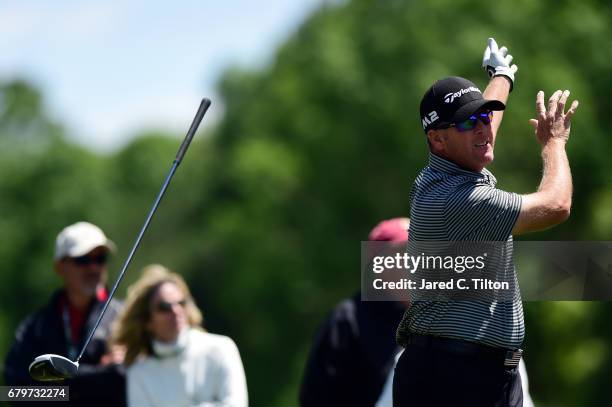 Points throws his club after playing his shot from the 12th tee during round three of the Wells Fargo Championship at Eagle Point Golf Club on May 6,...