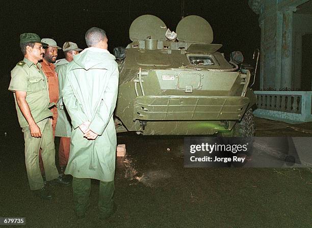 The Cuban military guards evacuated areas during the onslaught of Hurricane Michelle November 4, 2001 in Jaguey, Cuba.