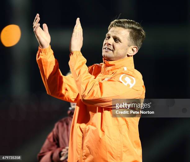 Televison Presenter Jeff Brazier applauds fans at the end of a Help for Heroes game between an RAF XI and a Celebrity XI at Sixfields on May 5, 2017...