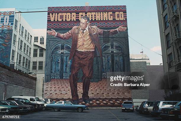 Actor Anthony Quinn is depicted in a huge mural advertising the Victor Clothing Company in Los Angeles, California, USA, January 1990. Titled 'The...