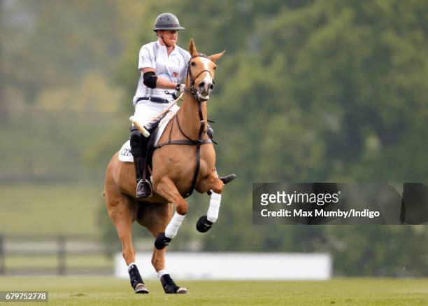 Prince Harry takes part in Audi Polo Challenge at Coworth Park Polo Club on May 6, 2017 in Ascot, England.
