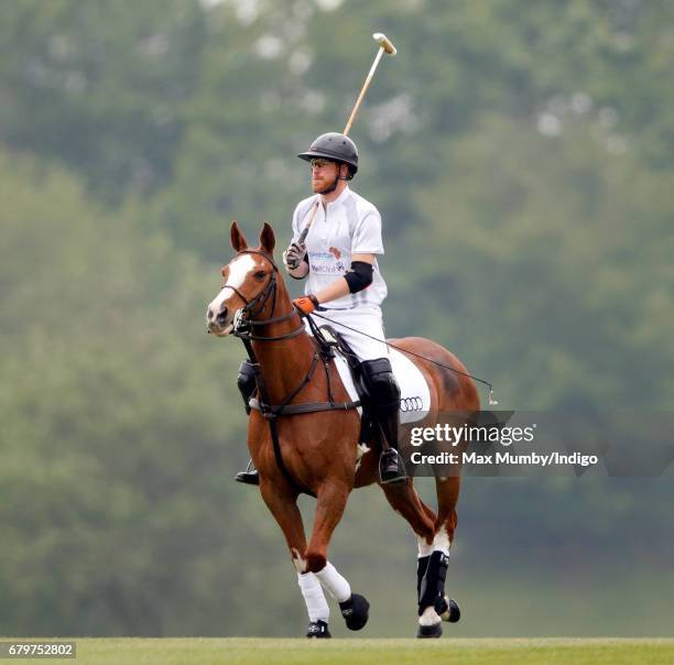 Prince Harry takes part in Audi Polo Challenge at Coworth Park Polo Club on May 6, 2017 in Ascot, England.