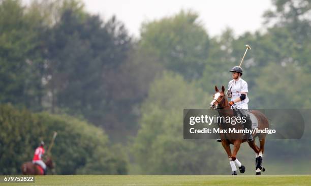 Prince Harry takes part in Audi Polo Challenge at Coworth Park Polo Club on May 6, 2017 in Ascot, England.