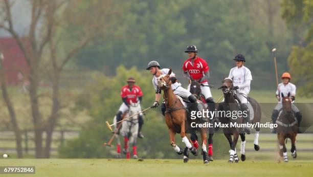 Prince Harry takes part in Audi Polo Challenge at Coworth Park Polo Club on May 6, 2017 in Ascot, England.