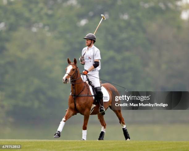 Prince Harry takes part in Audi Polo Challenge at Coworth Park Polo Club on May 6, 2017 in Ascot, England.