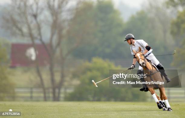 Prince Harry takes part in Audi Polo Challenge at Coworth Park Polo Club on May 6, 2017 in Ascot, England.