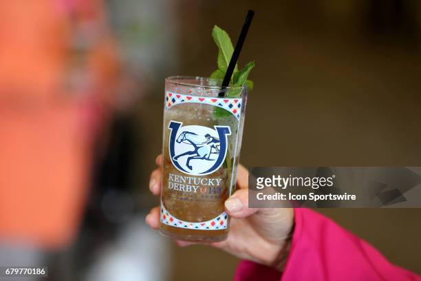 Kentucky Derby fans show off a Mint Julep prior to the running of the 143rd Kentucky Derby on May 06, 2017 at Churchill Downs in Louisville, Kentucky.