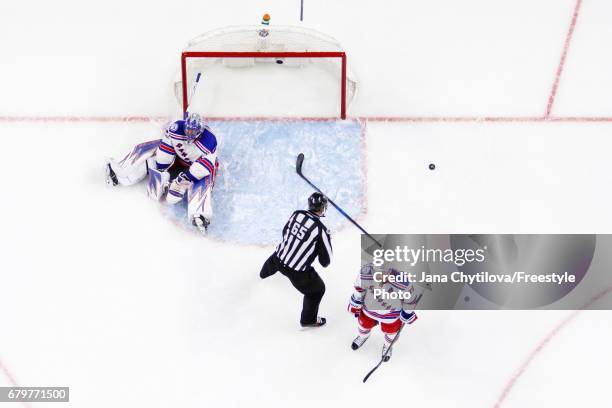 Henrik Lundqvist and Derek Stepan of the New York Rangers react after allowing the game tying goal by Derick Brassard of the Ottawa Senators in Game...